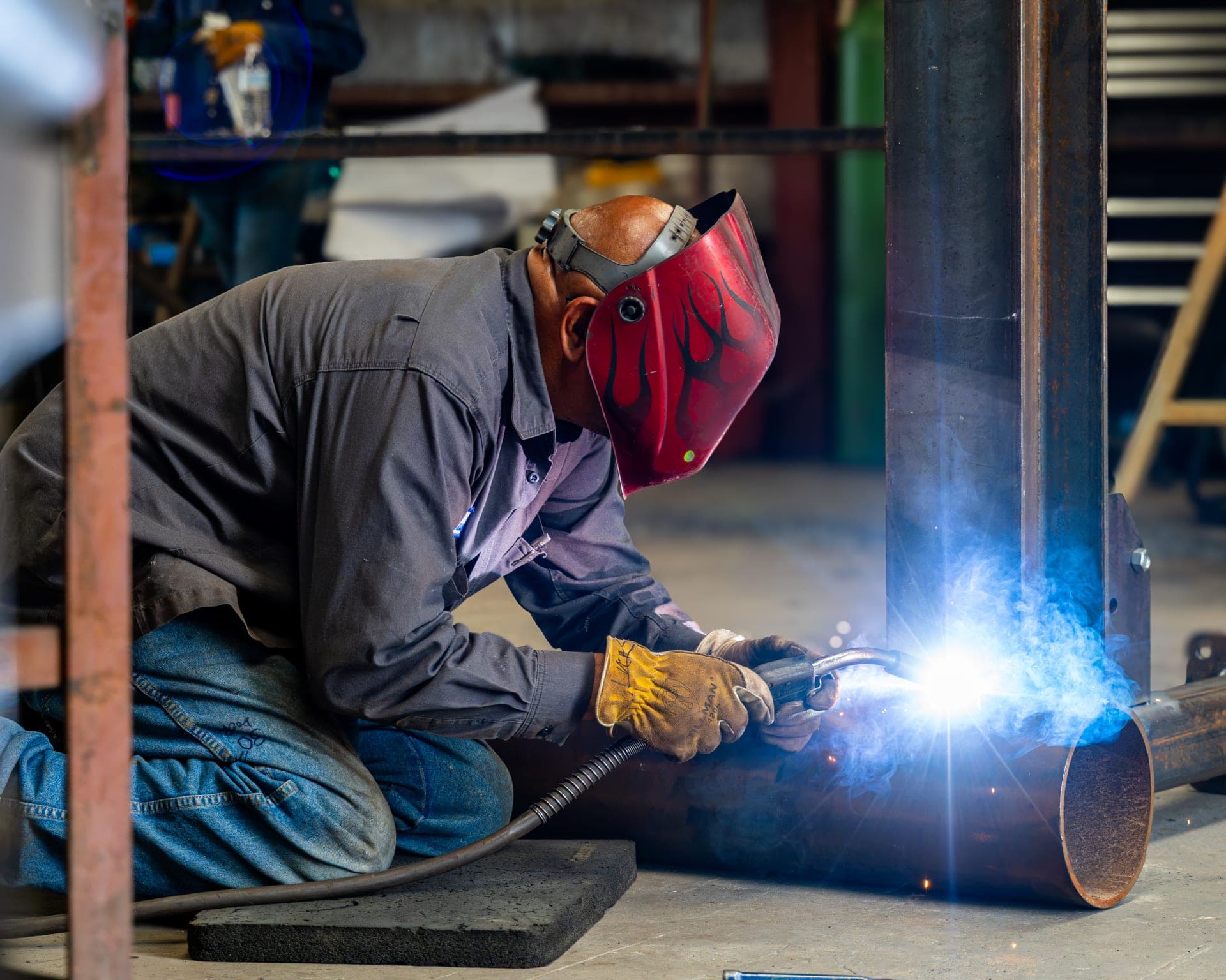 V&S Trades crew member welding in the shop